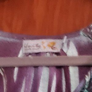 Unity  world West size XL colors are purples, white, blues